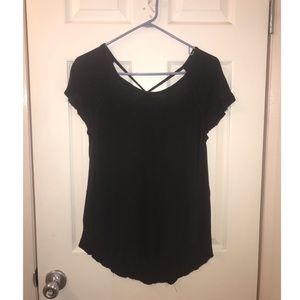 Flowy black top with cross in back